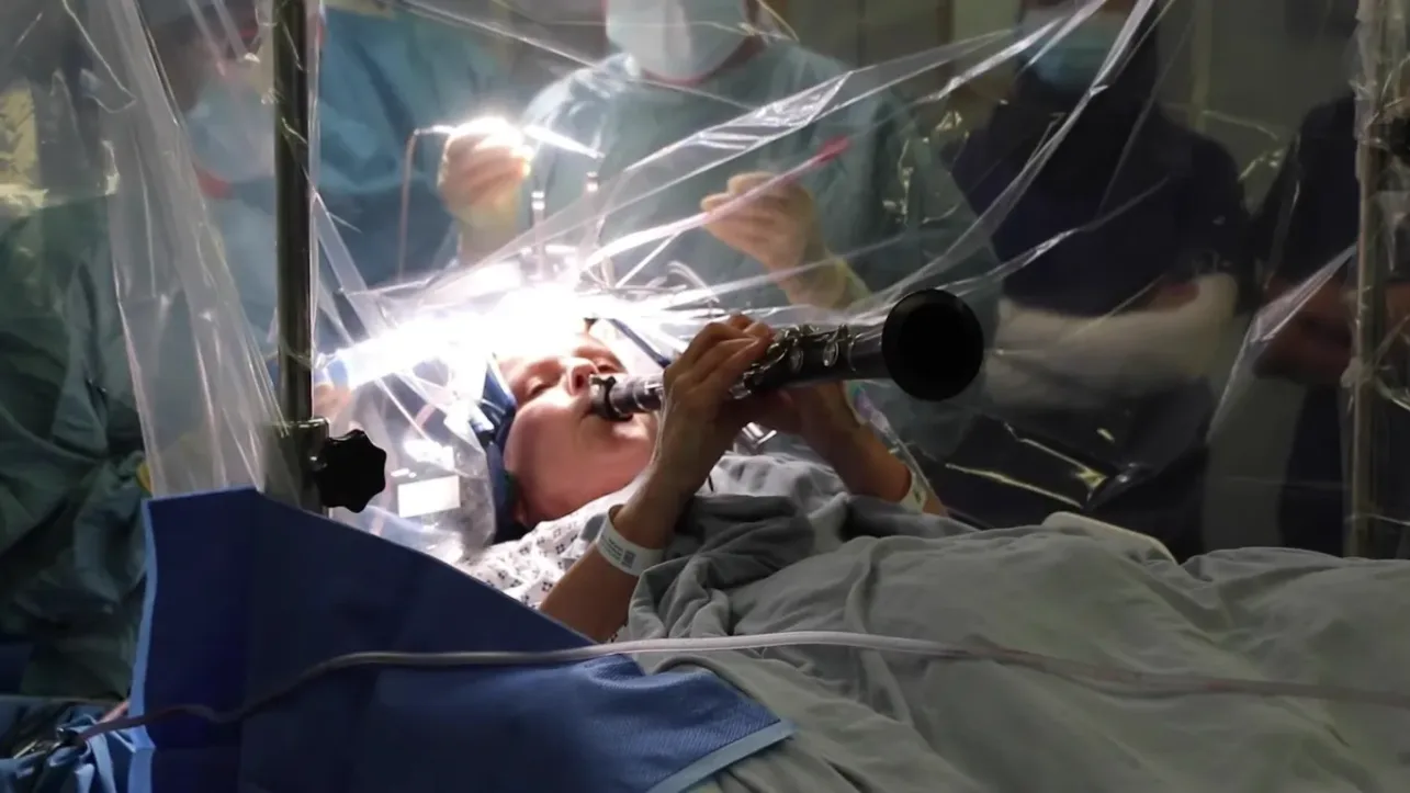 Patient Plays Clarinet During Brain Surgery: Parkinson's Woman Sees Instant Results 2 Patient plays clarinet during brain surgery for Parkinson's disease at King's College Hospital